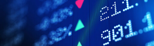 Close up image of stock ticker symbols