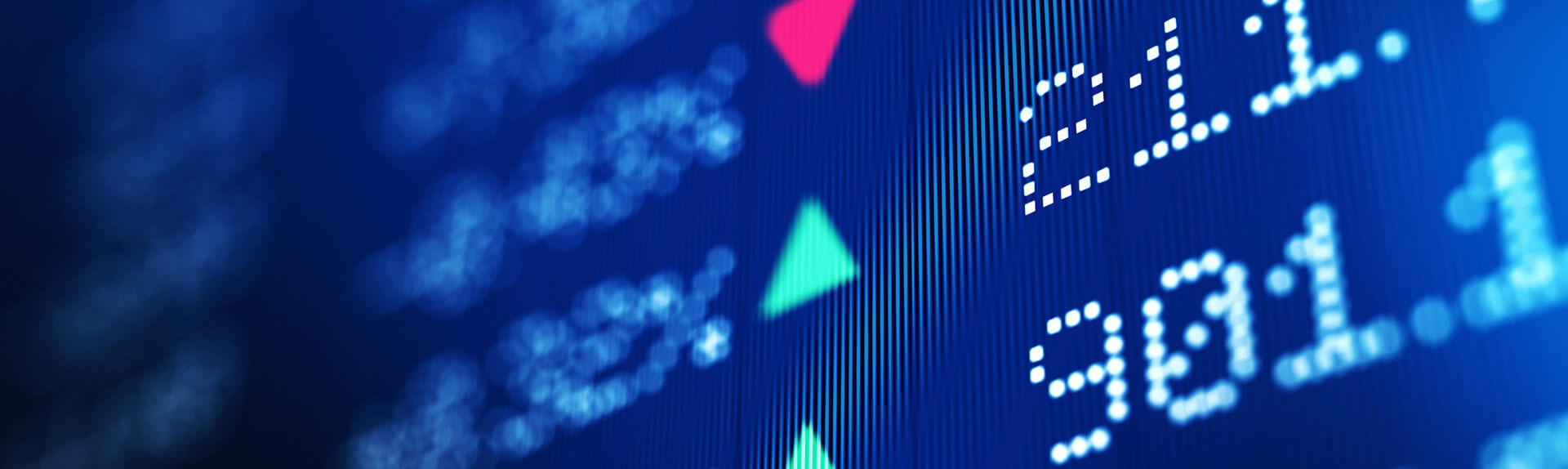 Close up image of stock ticker symbols